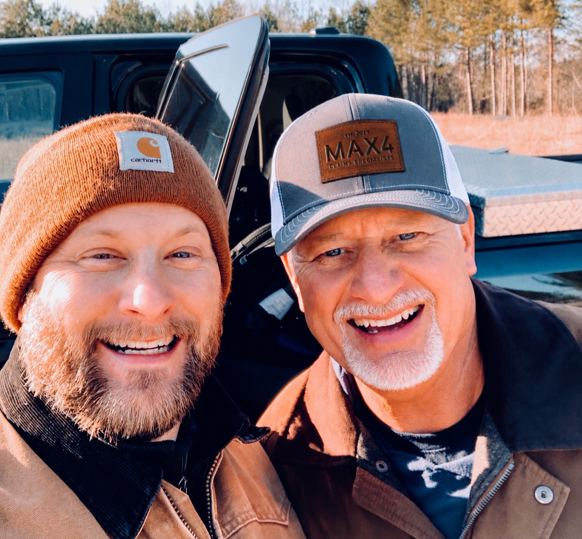 Ray and Justin Land reviewing a claim onsite